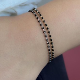 Detalhes do produto Pulseira Resinas negras em Ouro